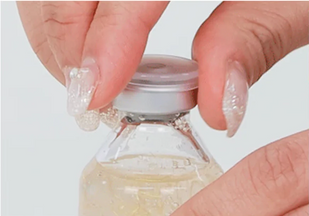 Remove the clear cap of the ampoule
