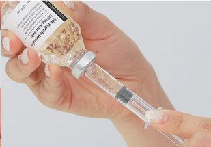 Insert syringe and tilt to dispense